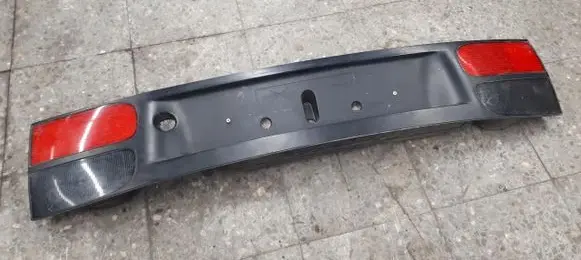 Renault Laguna I Trunk door license plate light bar 7703072198