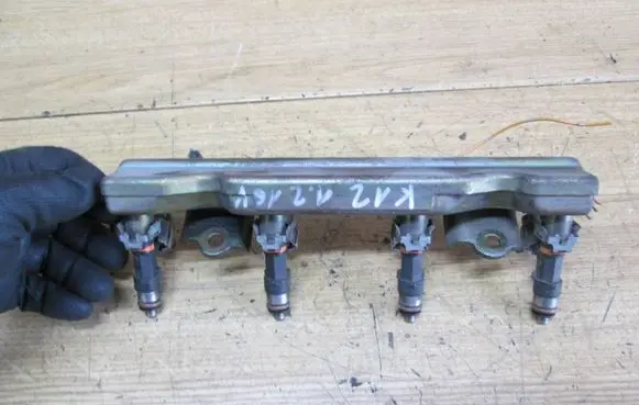 Nissan Micra Fuel injector 16600AX200 0280158013 170604123636