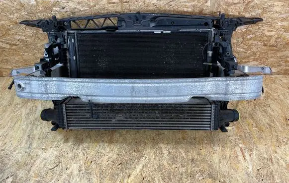 Radiator support slam panel
