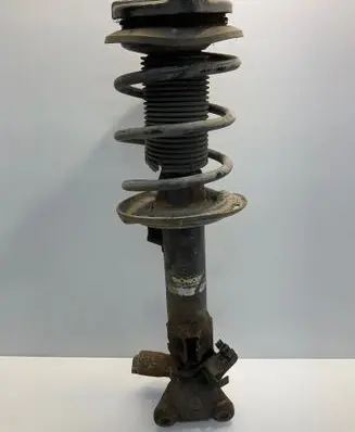 Mercedes-Benz E C207 W207 Front shock absorber with coil spring