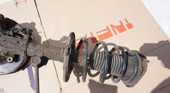 Toyota Avensis T270 Front shock absorber with coil spring SKO62895