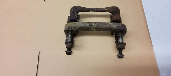 Opel Insignia A Brake caliper pad carrier rear 