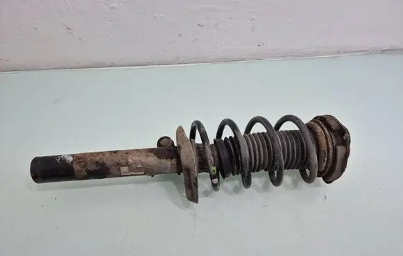 Seat Leon (1P) Front shock absorber with coil spring 