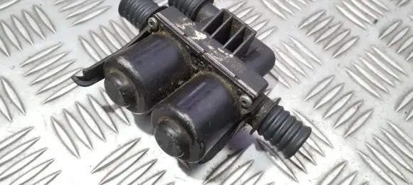 Coolant heater control valve