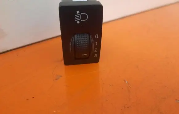 Chevrolet Aveo Headlight level height control switch