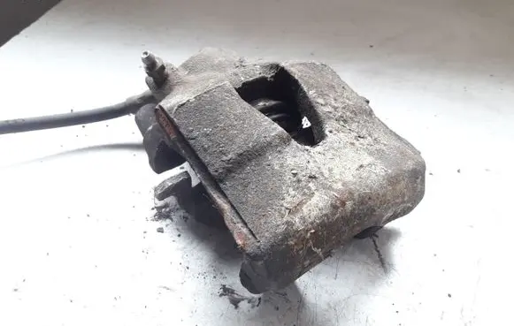 Volkswagen Golf V Front brake caliper
