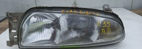 Ford Fiesta Headlight/headlamp 96FG13K060AA 1305219059
