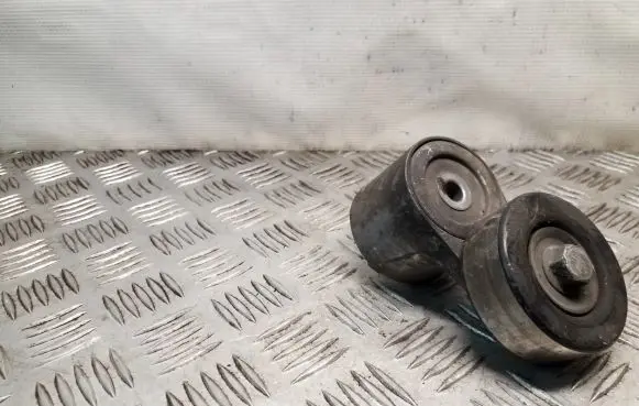 Chrysler Voyager Generator/alternator belt tensioner 04861630AB
