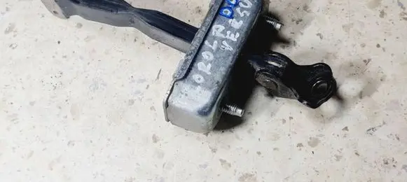 Rear door check strap stopper