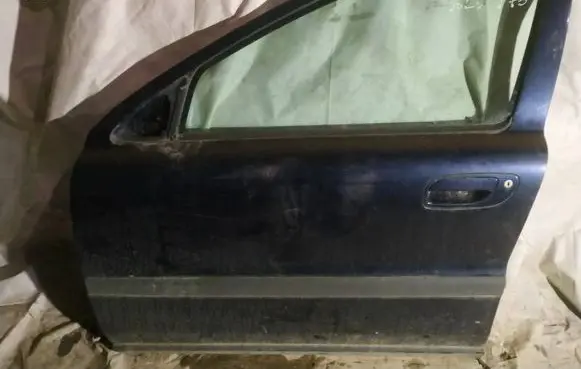 Volvo V70 Front door melynos