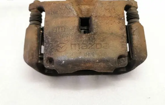 Mazda 3 II Front brake caliper K1900