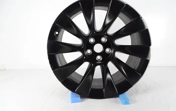 Tesla Model Y Original wheel cap 1188223-00-C