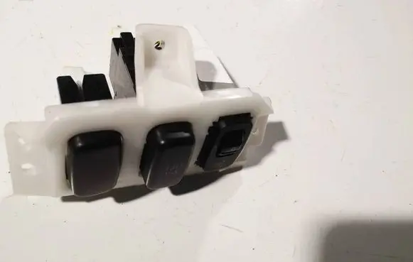 Mitsubishi Lancer X Headlight level height control switch