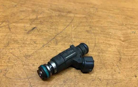 Subaru Legacy Fuel injector FBJC101 0014115