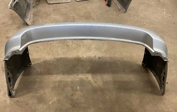 Subaru Legacy Rear bumper 57704AG070