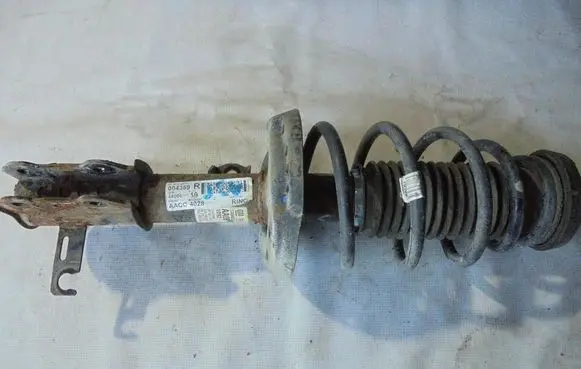 Opel Astra J Front shock absorber/damper 13354028