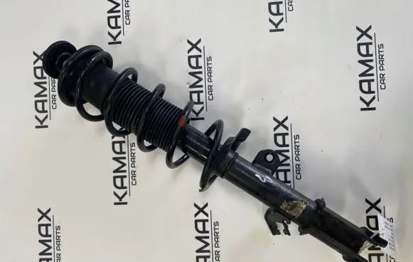 Nissan Note (E12) Front shock absorber with coil spring 543033VD0B