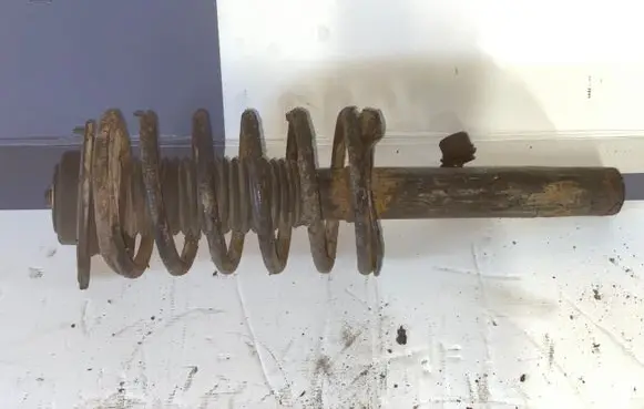 Citroen Berlingo Front shock absorber with coil spring