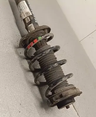 Front shock absorber with coil spring