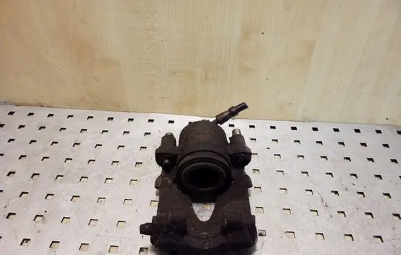 Volkswagen Golf IV Front brake caliper