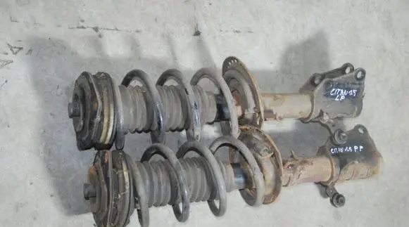 Front shock absorber with coil spring