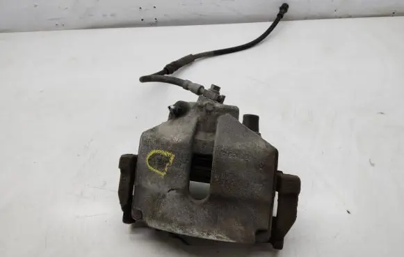 Volkswagen PASSAT B7 Front brake caliper