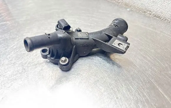 Opel Corsa D Thermostat/thermostat housing 0112016A
