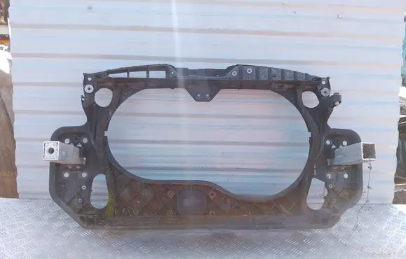 Top upper radiator support slam panel