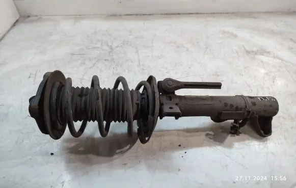 Mercedes-Benz E C207 W207 Front shock absorber with coil spring