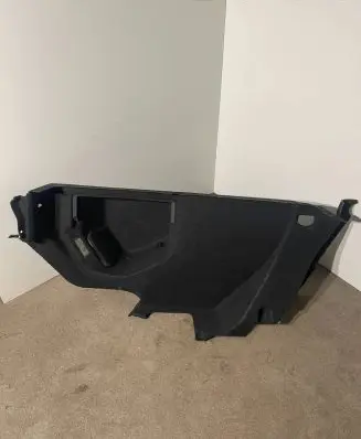 Trunk/boot lower side trim panel