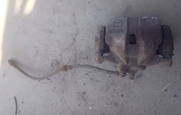 Mazda 6 Front brake caliper