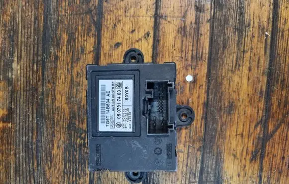 Ford Mondeo MK IV Door control unit/module 7G9T14B534AE 0507917400