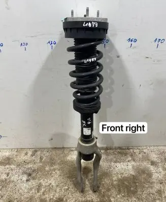 Front shock absorber with coil spring