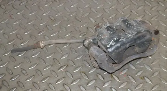 Suzuki Grand Vitara II Front brake caliper