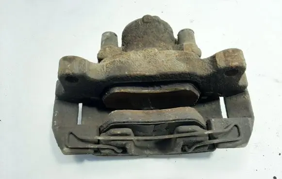 Volkswagen Golf VI Front brake caliper