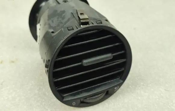Volkswagen Caddy Dash center air vent grill 2K0819703B