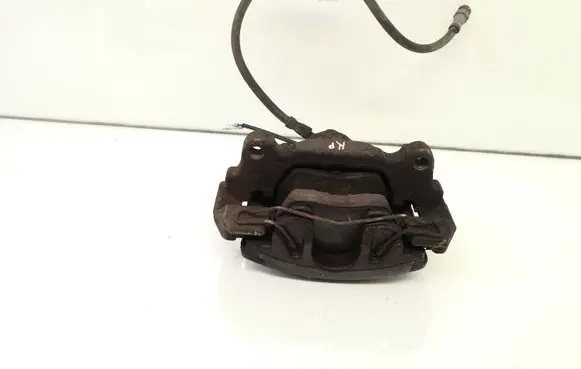 Volkswagen Touran I Front brake caliper 581