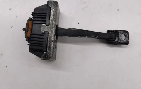 Front door check strap stopper