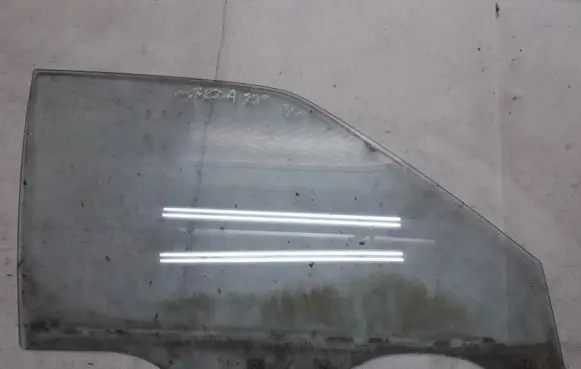 Mazda 323 Front door window glass four-door