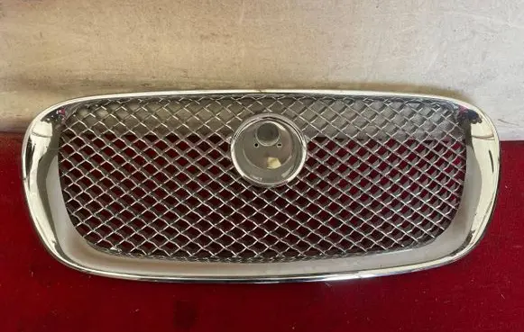 Jaguar XF Front bumper upper radiator grill 9X238A100AA