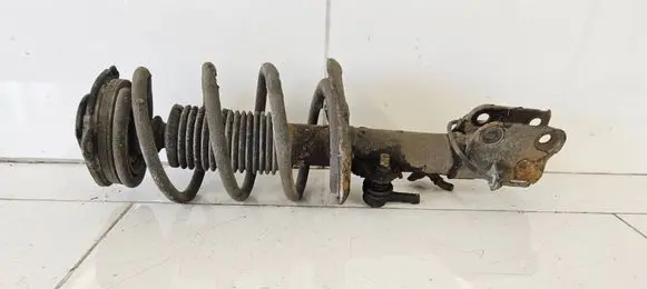 Nissan Leaf I (ZE0) Front shock absorber with coil spring