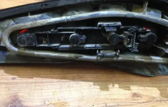 Renault Laguna I Tail light bulb cover holder