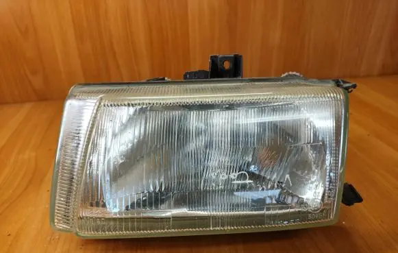 Volkswagen Caddy Headlight/headlamp 89304499 087623 06H06