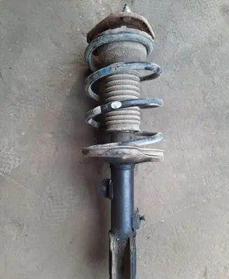 Toyota Avensis T250 Front shock absorber with coil spring NOCODE