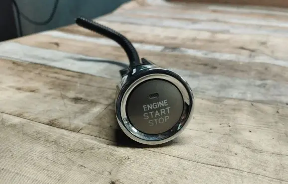 Engine start stop button switch