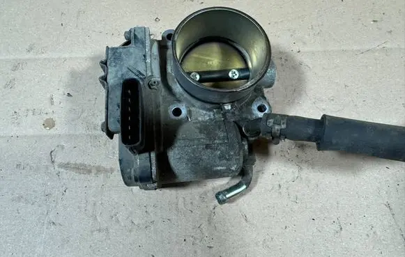 Mitsubishi Lancer VIII Throttle body valve 