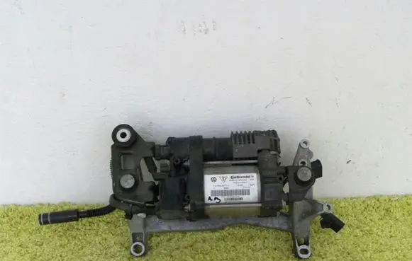Volkswagen Touareg II Air suspension compressor/pump 7p0616006j