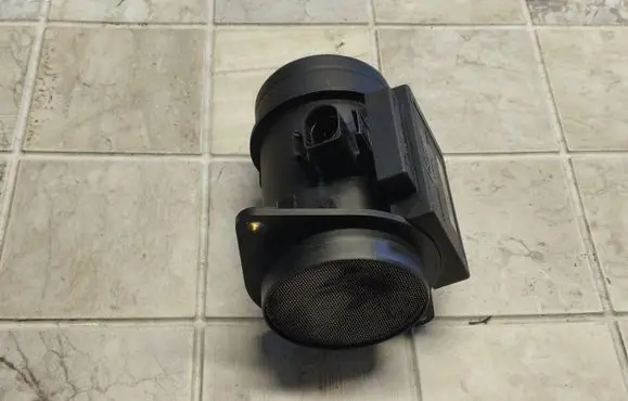 Volkswagen PASSAT B4 Mass air flow meter 71822151