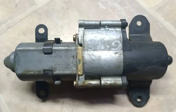 Chrysler Grand Voyager IV Sliding door motor 7746804601 1801120
