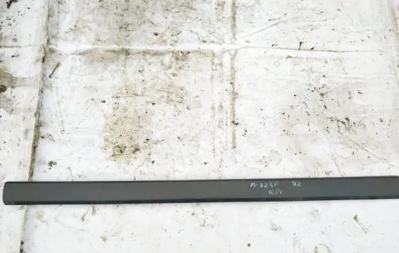 Mazda 323 F Front door trim (molding) b48150692
